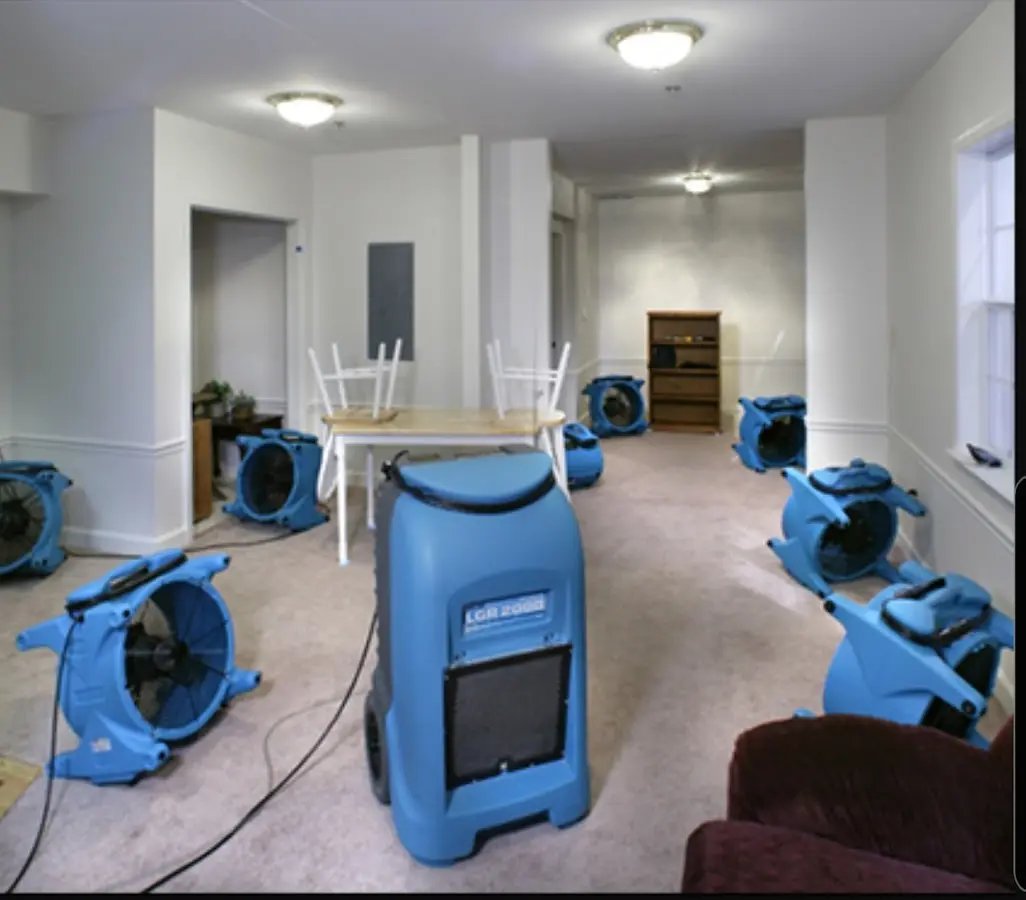 Air movers and dehumidifier setup for Water Extraction & Removal in Arkansas City