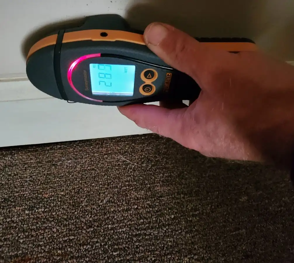 Moisture detection at baseboard during Storm Damage Restoration in Arkansas City